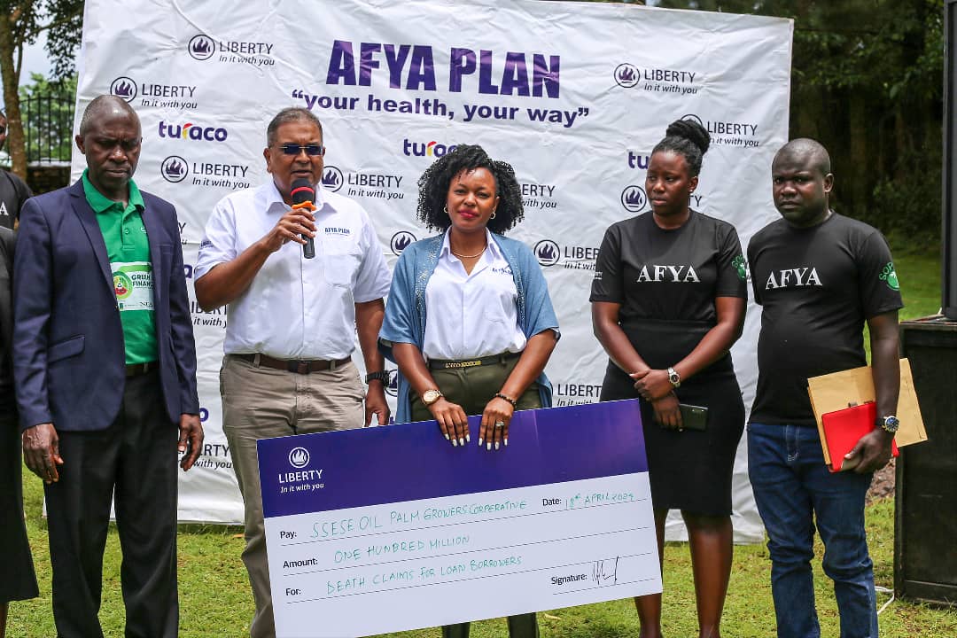 Liberty pays shs100m in life insurance claim to Kalangala family