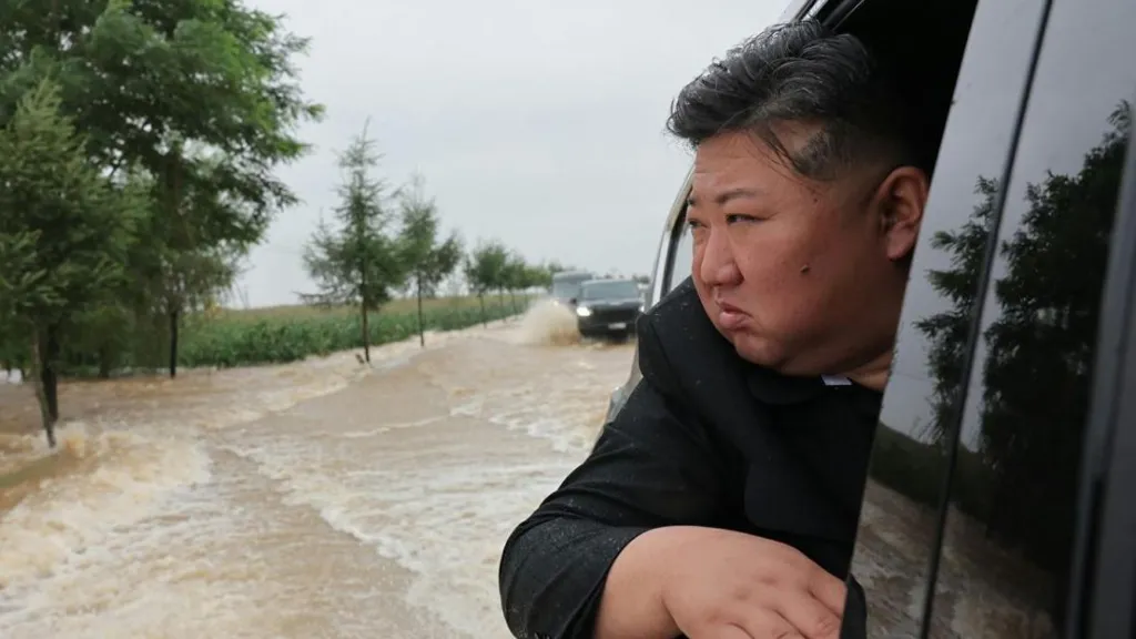 North Korea's Kim drives through floods after emergency call