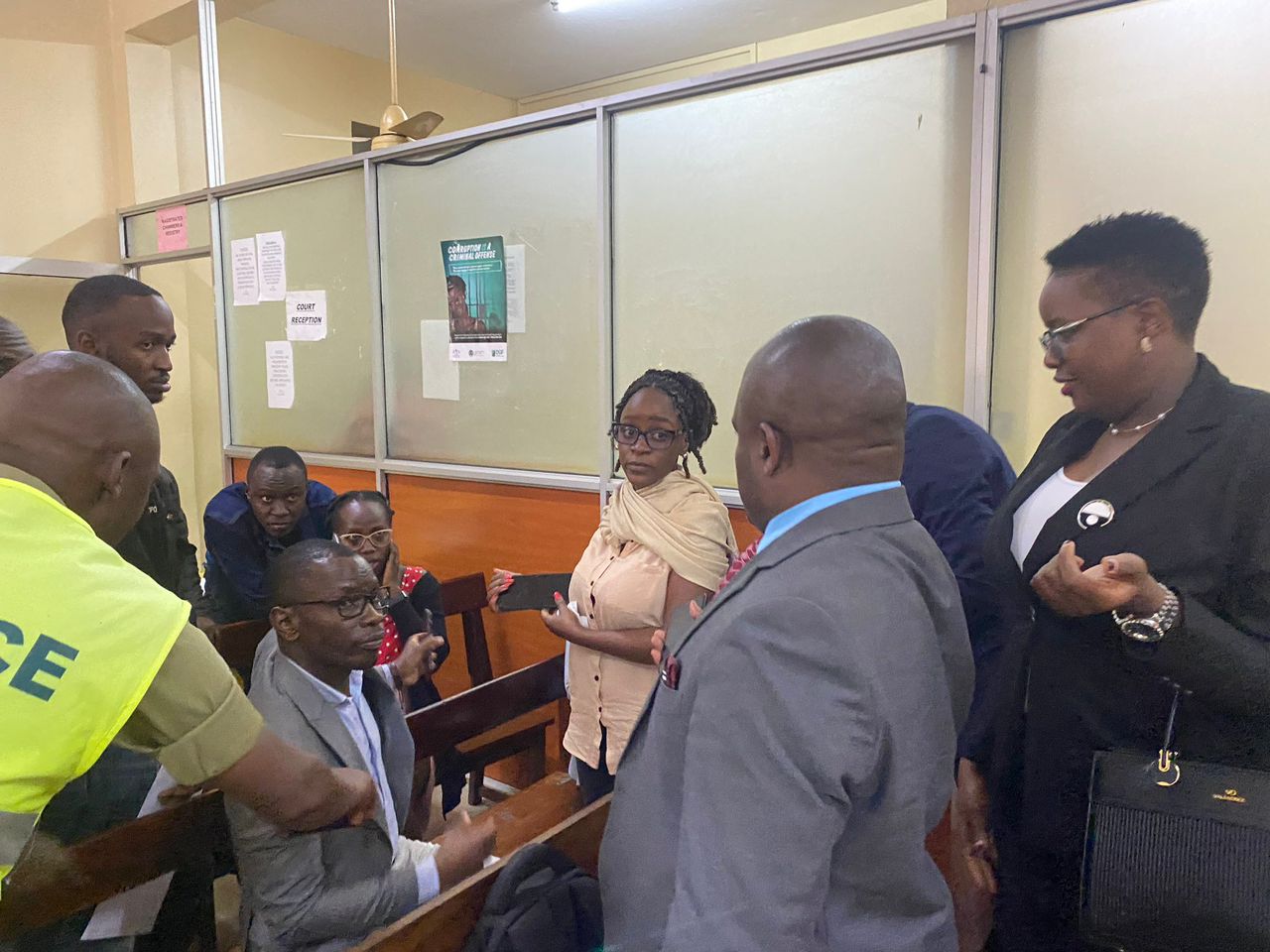 Activists arrested at press briefing charged with unlawful assembly