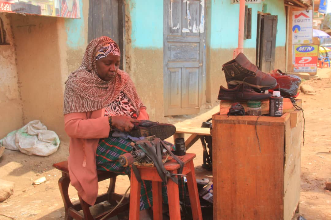 Benimana thrives as a female cobbler along Kabale-Katuna Road