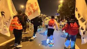 China roads blocked by thousands of cyclists in night quest for dumplings