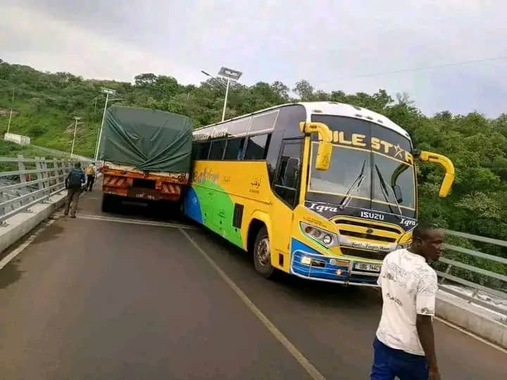 Caution Bells Ring Loud as Truck and Bus Brush Sides on Karuma Bridge