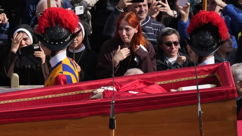 Thousands at Vatican as mourners file past Pope Francis's open coffin