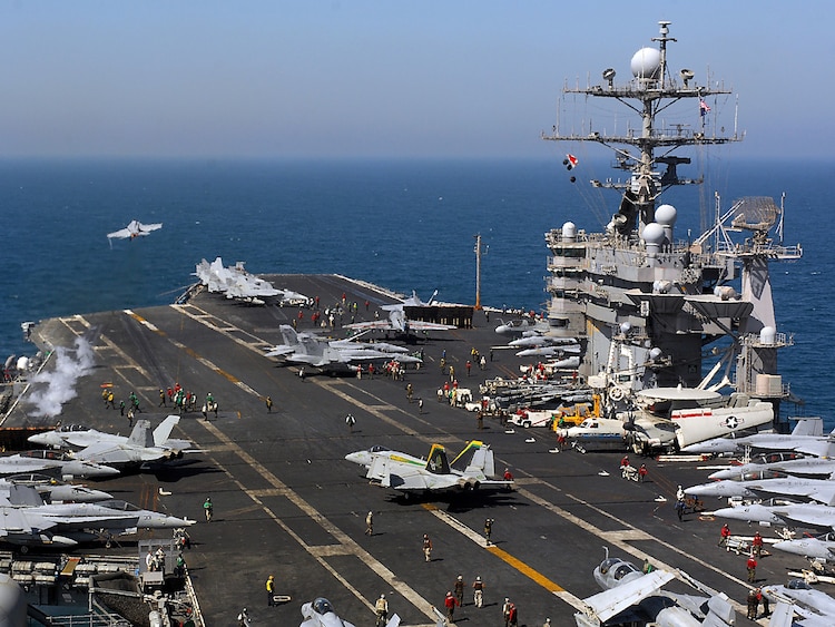 US fighter jet rolls off aircraft carrier, sinks into ocean