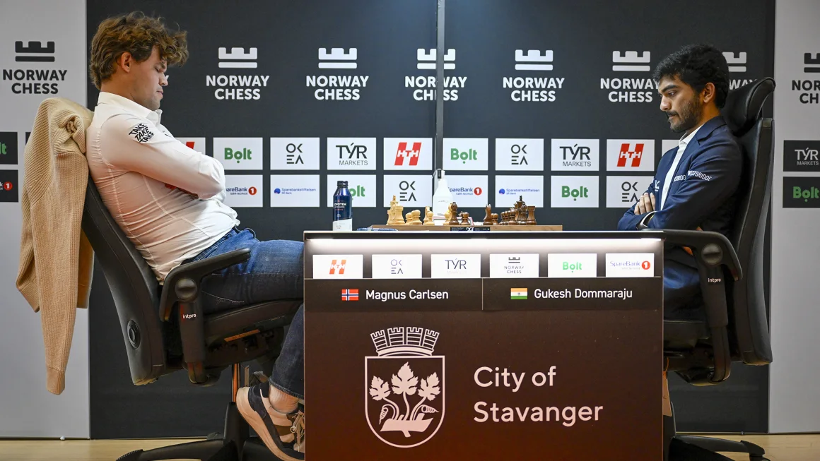Magnus Carlsen slams table in frustration after shock loss to world champion Gukesh Dommaraju in ‘turnaround of the year’