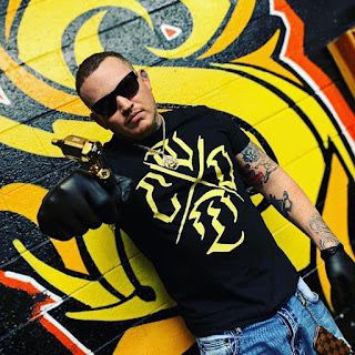 Colorado Man Sets Guinness World Record with 100 Eyeball Tattoos