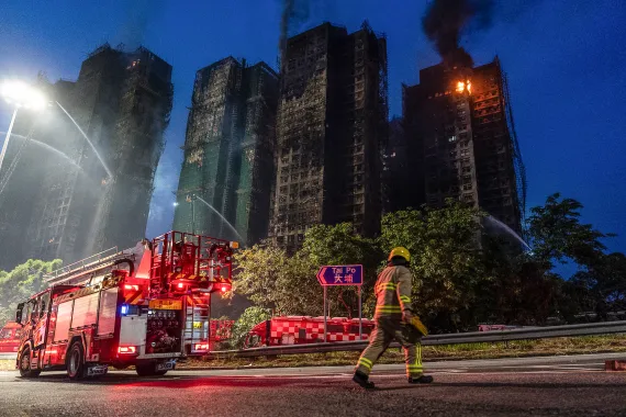 Eight more arrested over fire in Hong Kong that killed at least 128 people
