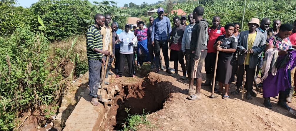 Ntungamo MP Hopeful Muchureezi Leads Residents in Repair of Damaged Bridge