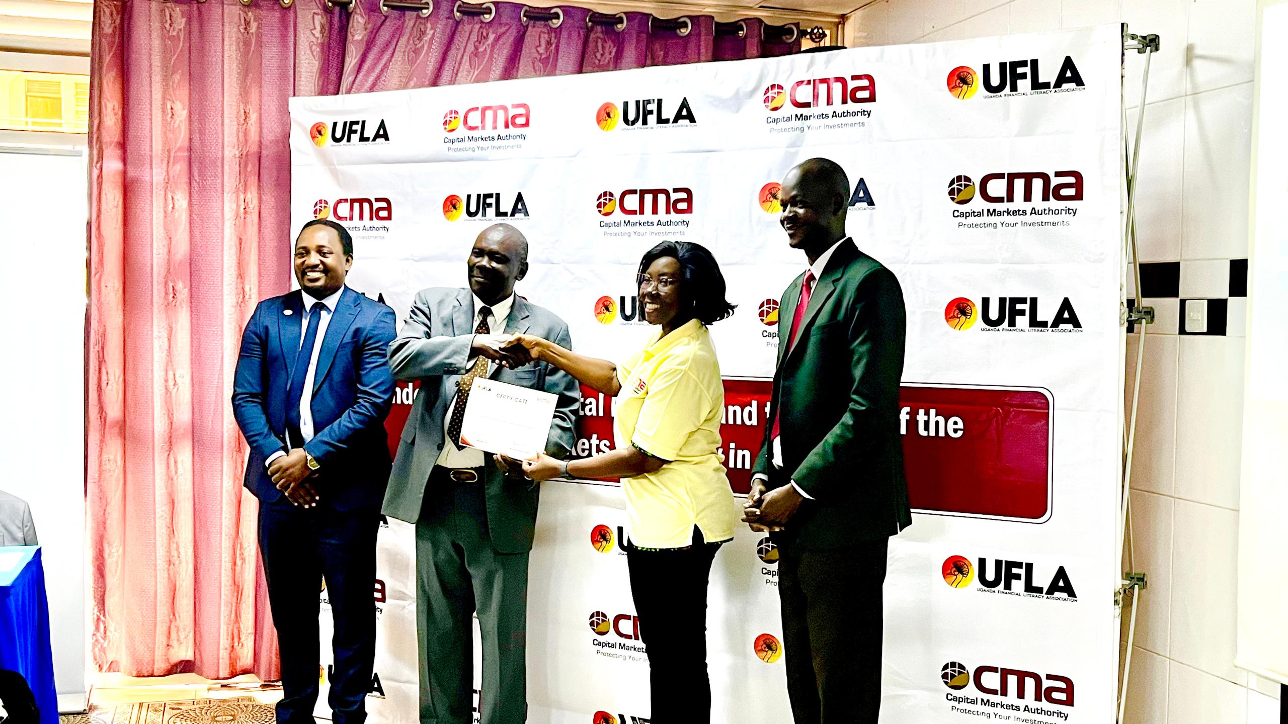 CMA and Financial Literacy Association Train 70 Northern Uganda Trainers