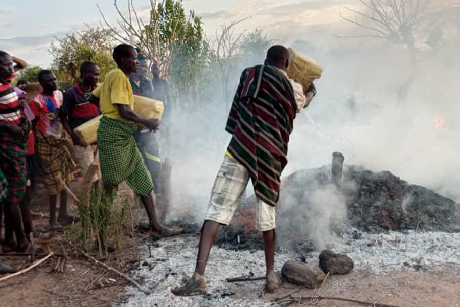 Youth Hunting Rats for Food Burn Houses to Ashes