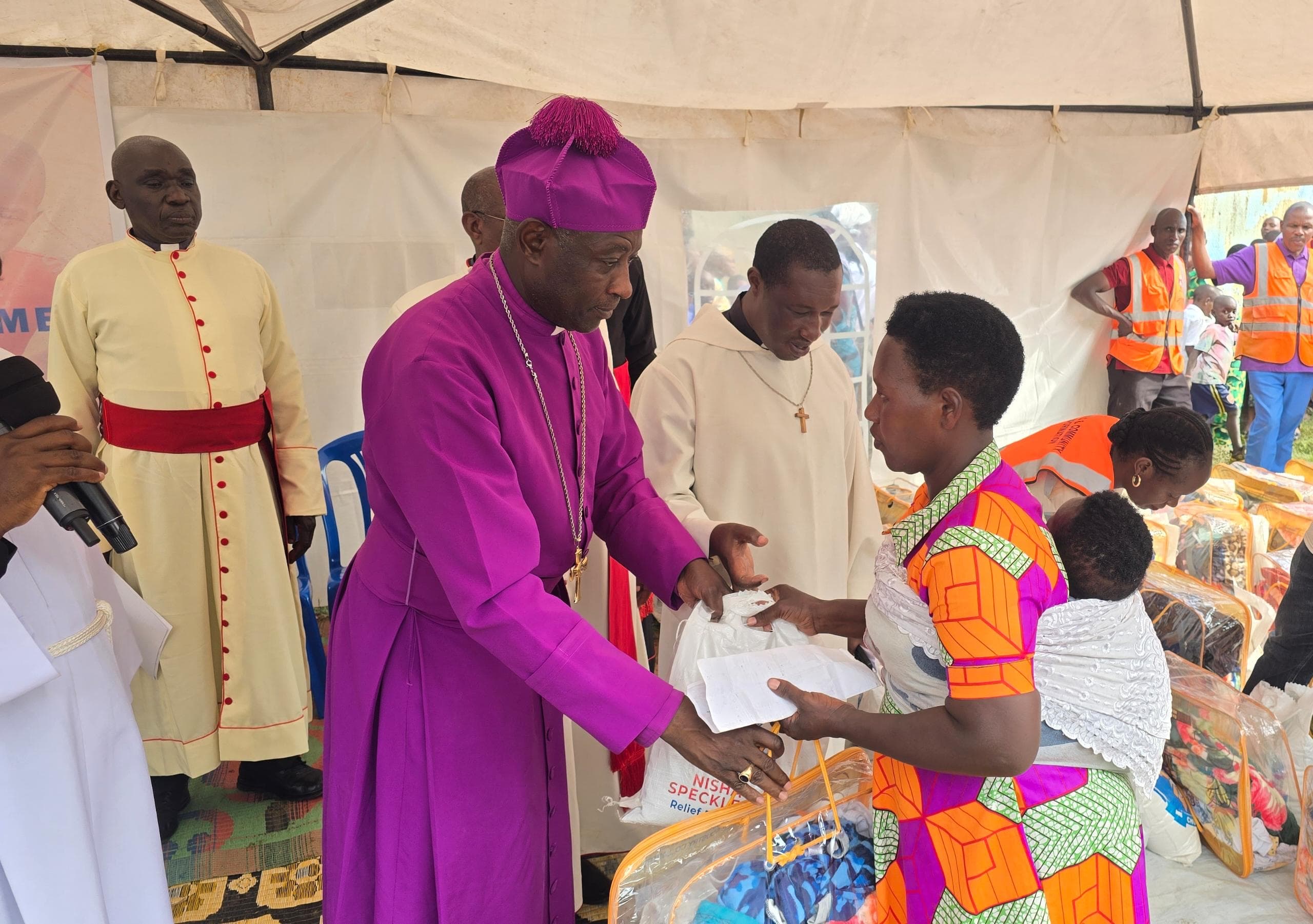 Archbishop Kaziimba Launches COU Children’s Month in Nakivale, Delivers Relief to Refugees