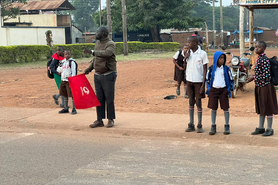 Ivan Tibaijuka, the Boda Rider Who Spends Half His Day Volunteering to Help Schoolchildren Cross Streets