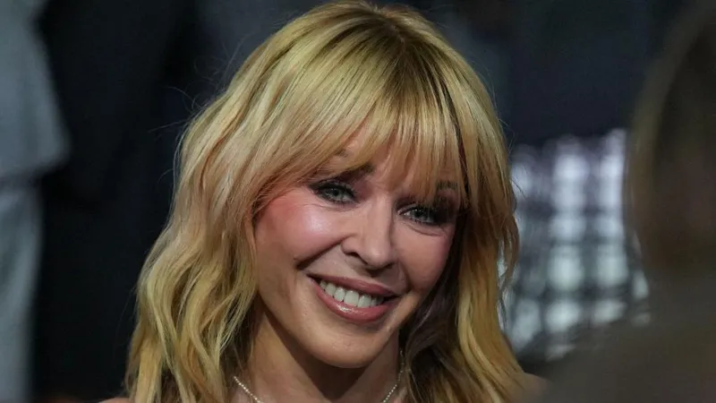 Kylie Minogue says cancer experience 'still with me'