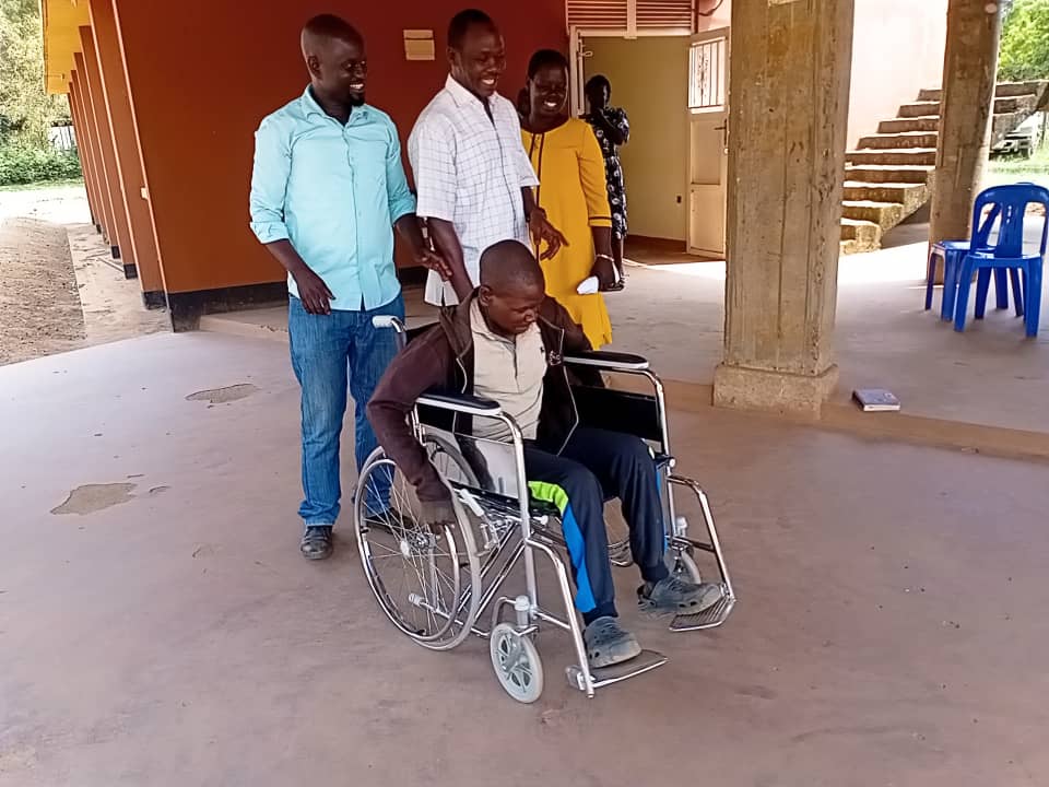 After 25 Years of Waiting, Nebbi Man Finally Gets His First Wheelchair