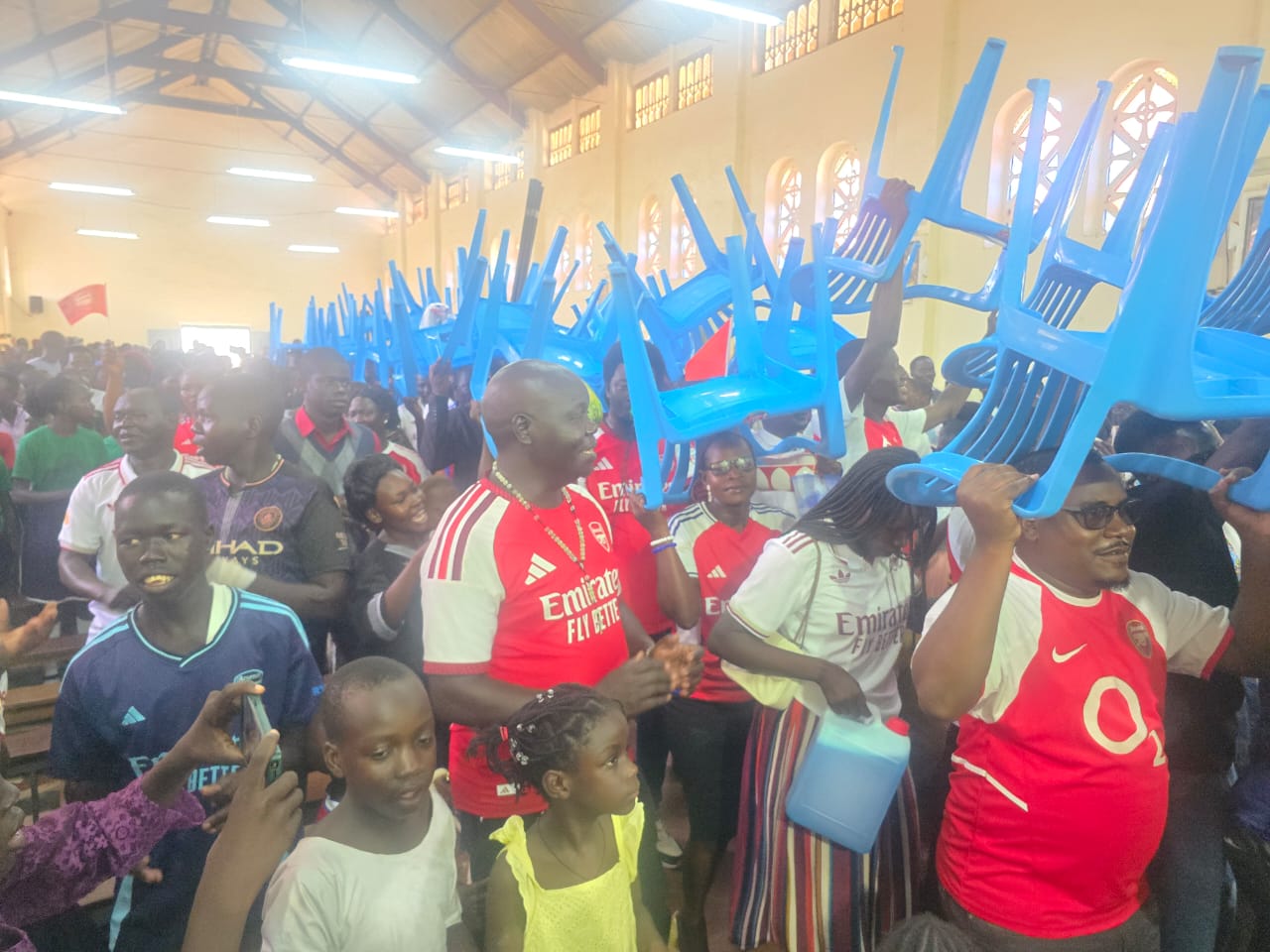 Arsenal supporters blend faith and community service at Adjumani Mass