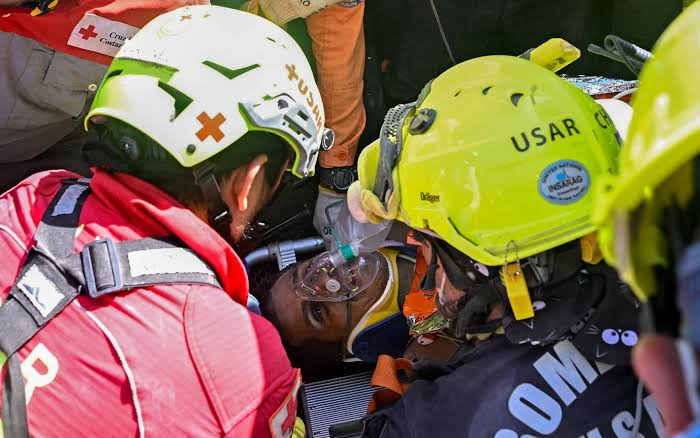 Venezuela quake survivor pulled out alive after eight days