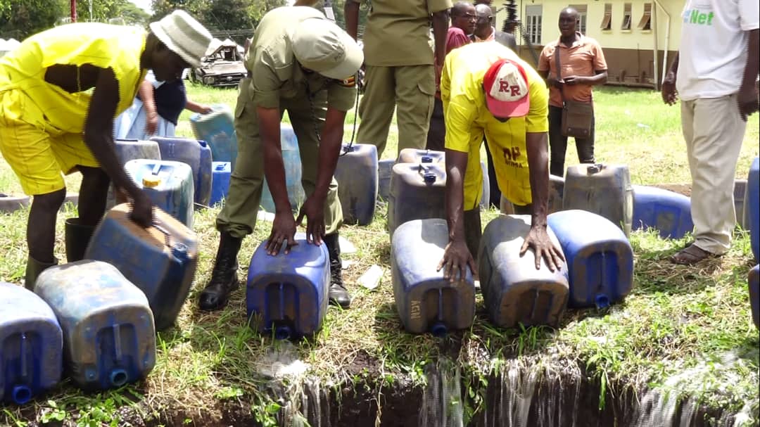 Police impound and destroy 128 jerrycans of waragi