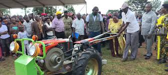 OPM donates farms tools, iron sheets to Bunyoro