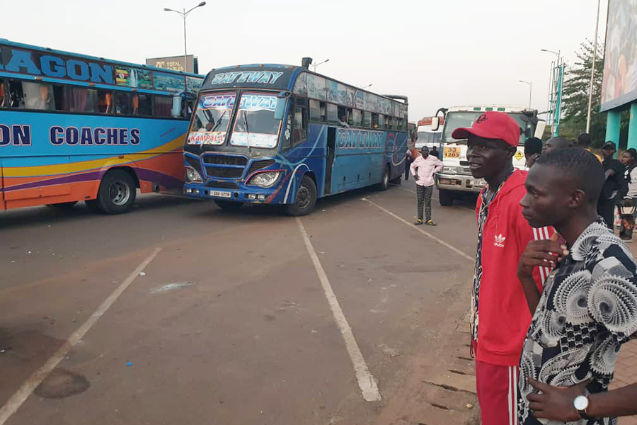 Travellers Stranded at Nile Bridge as Police Enforce Badge Rule for Bus Drivers