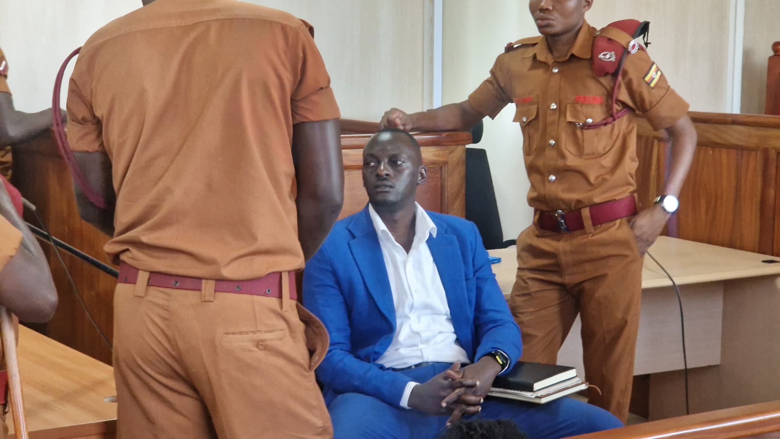 Confusion as Eron Kiiza Brought to Court After Judge Delays Ruling