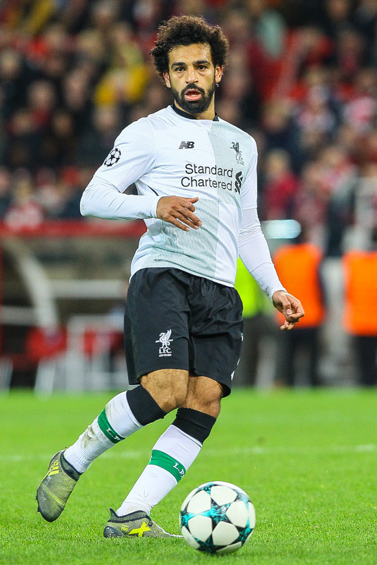 Gharbia, Egypt. 13th May, 2018. A picture made available on 21 May shows an  Egyptian boy, wearing the jersey of Liverpool's Mohamed Salah, practising  football at a field, at the Egyptian star's