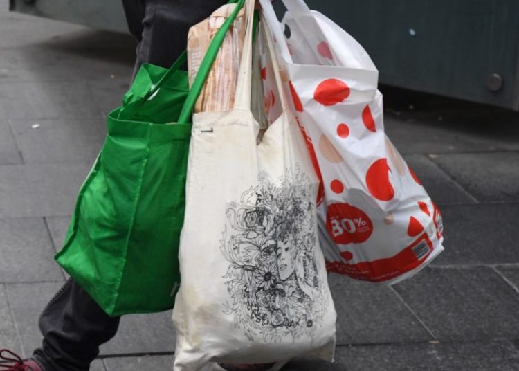 Ugandan woman turns plastic bags into backpacks