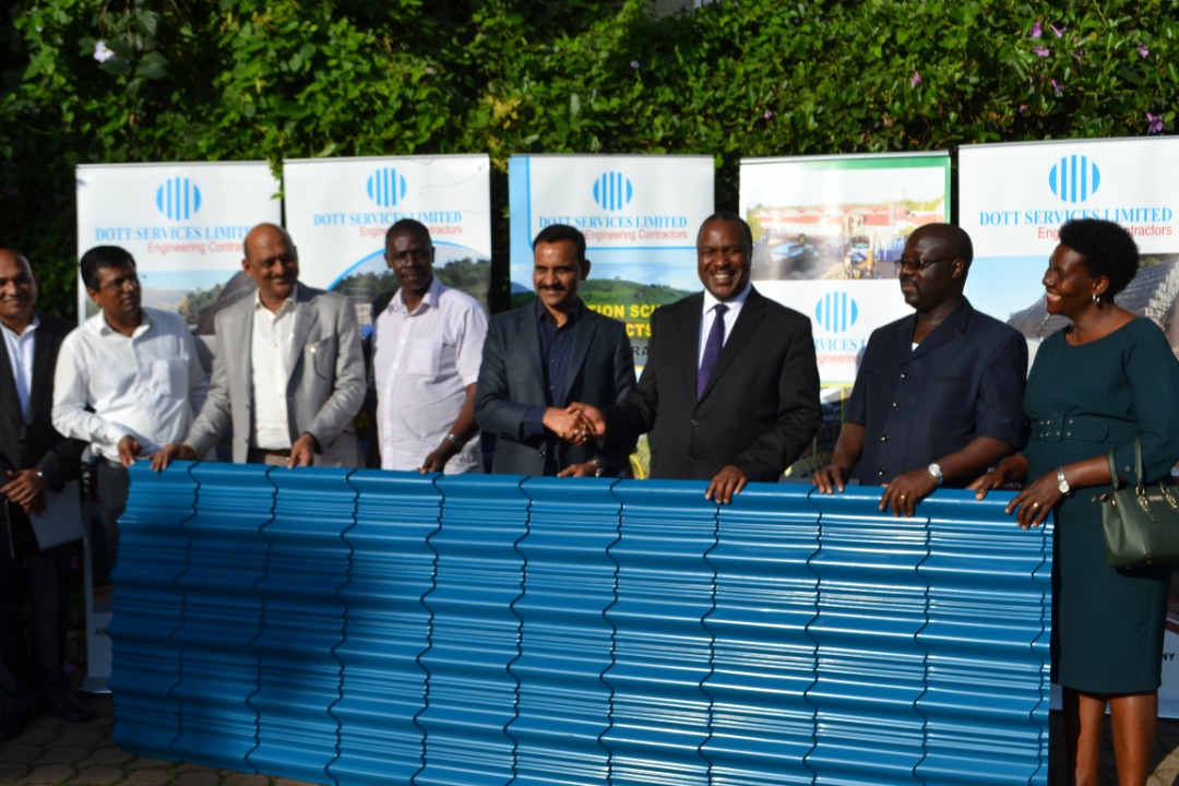 Dott Services donate  100 iron sheets to Sheema Church