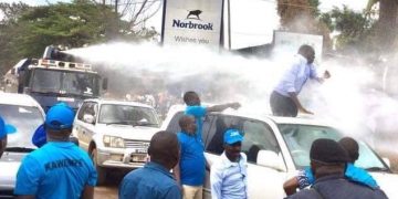 Internal Affairs Minister defends Police brutality on Besigye as being inevitable