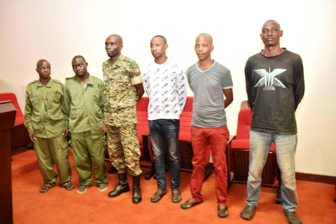 Five civilians committed to army court for trial