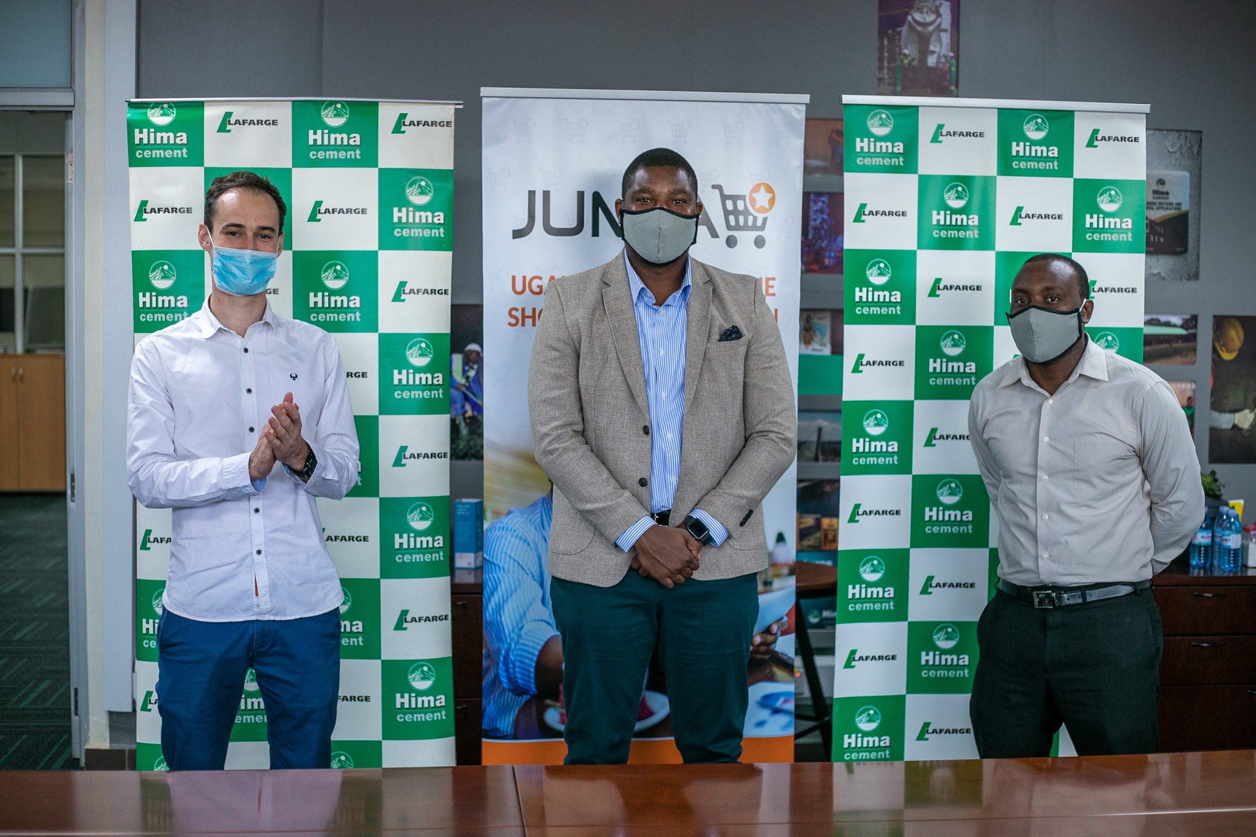 Hima Cement and Jumia officials sign the agreement