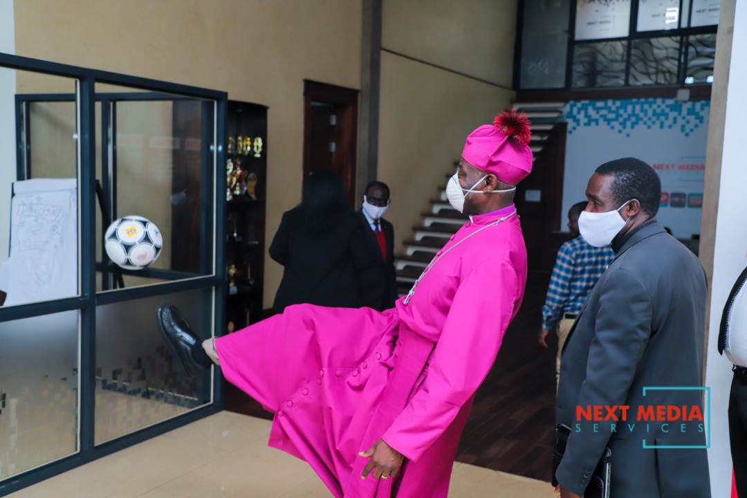 Archbishop Kazimba shows off his soccer skills 