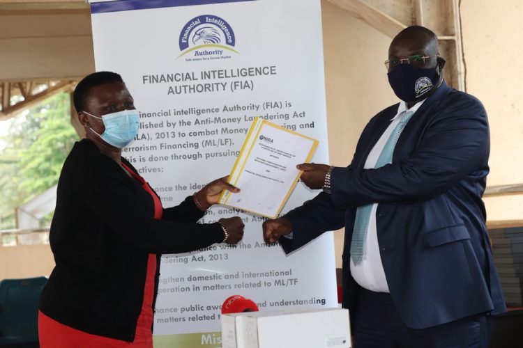 NIRA Signs Agreement With Financial Intelligence Authority To Access National ID Data Base