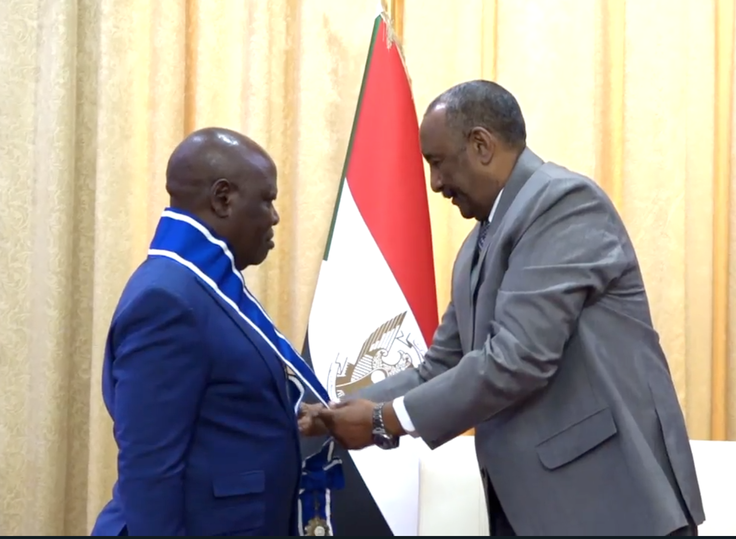 Amb. Kinobe decorated with First Class Order of the Nile Medal from Sudan