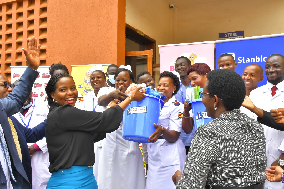Stanbic, MTN gift workers at Kawempe Hospital ahead of Christmas
