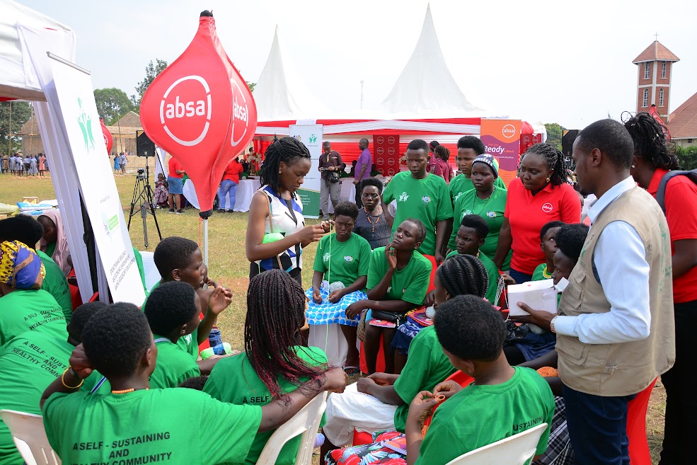 Absa Women's Forum, skills, donates to teenage mothers in Kyegegwa