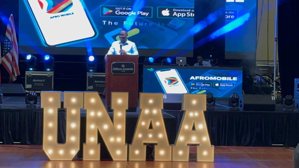 Kin Kariisa addresses UNAA Convention as Next Media goes global